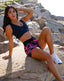 Matching pink camo gym set for women. Pperfect gym set to go running, jogging, or even yoga class. Shop our premium gym shorts with adjustable straps for comfort.